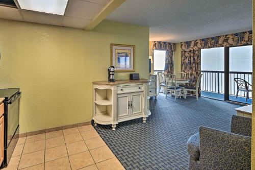 a living room with a view of the ocean at Oceanfront Myrtle Beach Rental with Pool! in Myrtle Beach