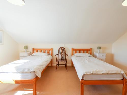 Una cama o camas en una habitación de The Cobbles