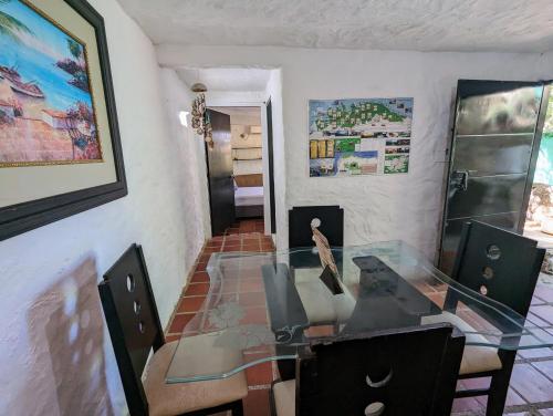 TV a/nebo společenská místnost v ubytování Casa de Piedra Taganga