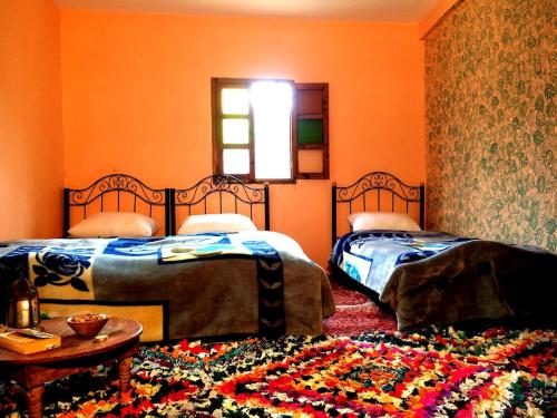 Postel nebo postele na pokoji v ubytování Gite entre les Vallées