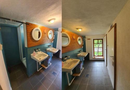 a bathroom with two sinks and two mirrors at Rony Villa - In the middle of nature in Przesieka