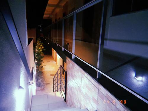 an empty hallway of a building at night at BORA BORA RESIDENCE in Joinville