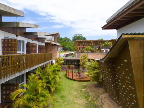 a view of the courtyard of a resort at Pousada Rosa Tropicalia in Praia do Rosa