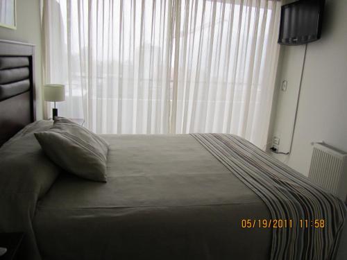Cama o camas de una habitación en Rentasuite Lyon