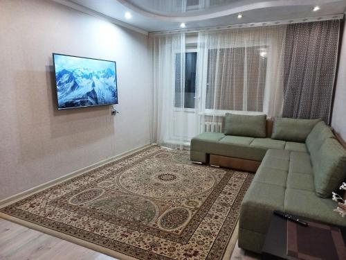 טלויזיה ו/או מרכז בידור ב-Апартаменты для гостей на Назарбаева 44
