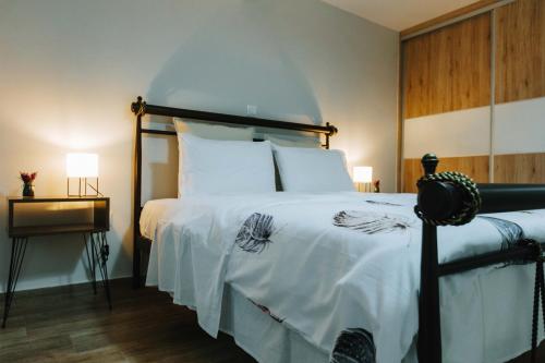Postel nebo postele na pokoji v ubytování Hermes Appartment