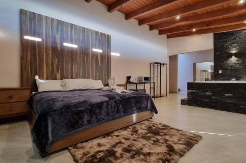 Postel nebo postele na pokoji v ubytování No 4 Lofts Jacuzzi Mazamitla