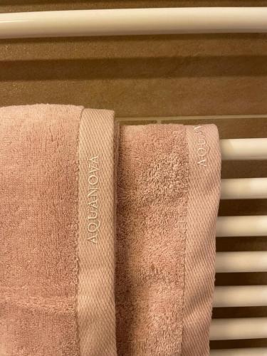 a pair of towels hanging on a keyboard at Haus Freunden in Sankt Anton am Arlberg
