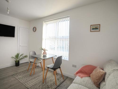 Μια τηλεόραση ή/και κέντρο ψυχαγωγίας στο Port Apartment 1