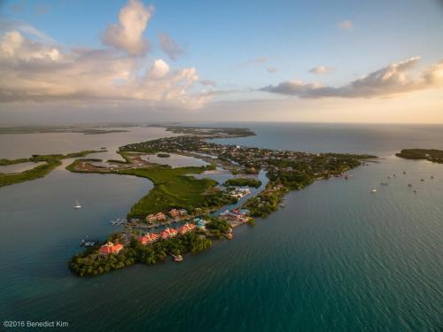 an aerial view of an island in the water at Placencia Pointe Townhomes #8 in Placencia Village
