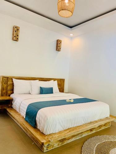 Postel nebo postele na pokoji v ubytování Oasis Villas