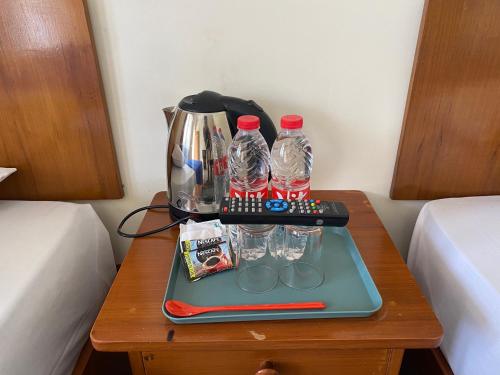 Příslušenství pro přípravu čaje a kávy v ubytování Hotel Puspa Sari