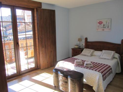 Giường trong phòng chung tại La Posada de Toribia