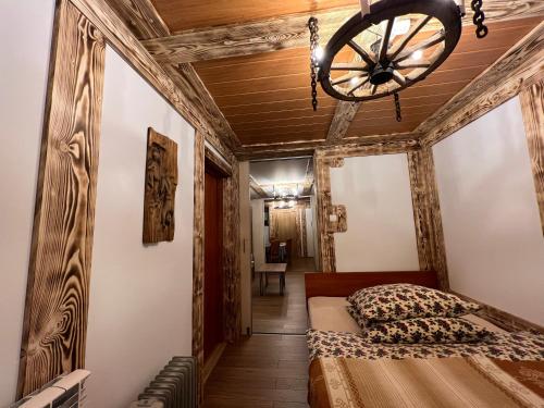 Postel nebo postele na pokoji v ubytování Apartamenty i Domki Taterka