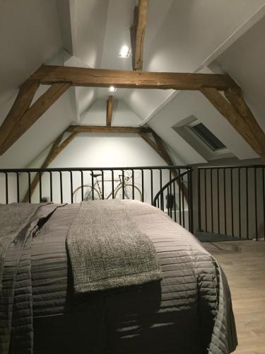 Cama o camas de una habitación en B&B Den Engel