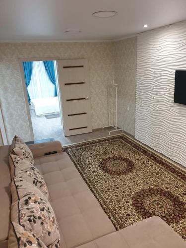 Μια τηλεόραση ή/και κέντρο ψυχαγωγίας στο Apartment on Metallurgov 32