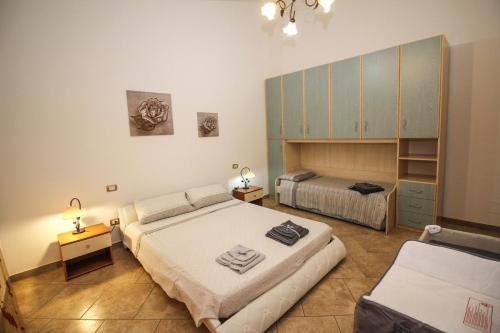 Postel nebo postele na pokoji v ubytování Casa di Fabia