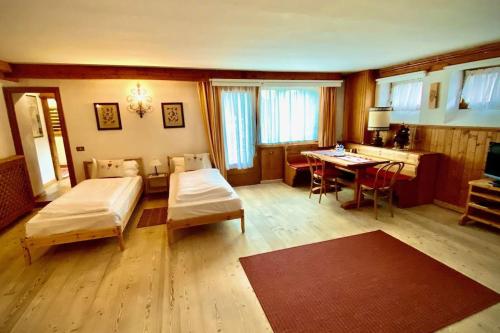 En eller flere senge i et værelse på Camera 4 letti +ang cucina/bagno all'interno Villa