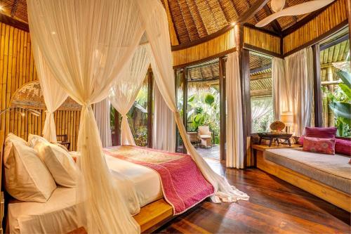 Postel nebo postele na pokoji v ubytování Fivelements Retreat Bali