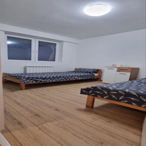 Ένα ή περισσότερα κρεβάτια σε δωμάτιο στο Iznad oblaka B09