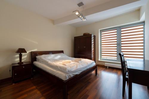 Katil atau katil-katil dalam bilik di Apartamenty Zeta Park w centrum Ustronia - Dream Apart