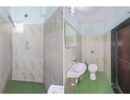 een badkamer met een wit toilet en een wastafel bij Hotel Dharamlok,Agra in Agra