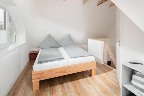 Postel nebo postele na pokoji v ubytování Haus Erika Fewo Süd-Ost