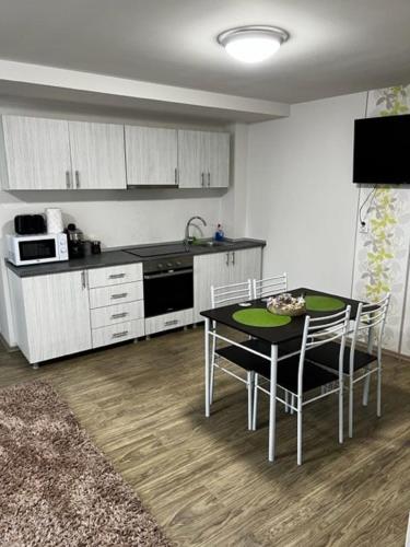 Kuchyň nebo kuchyňský kout v ubytování Apartament 9 Central