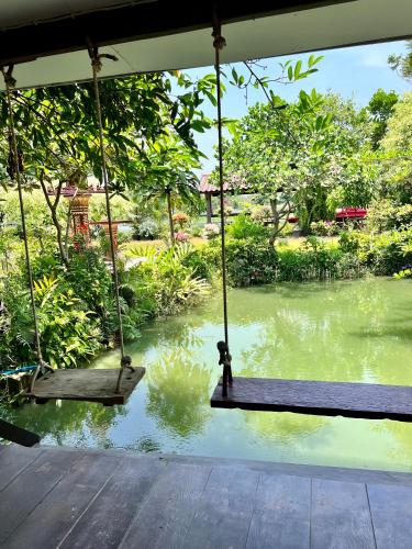 Zahrada ubytování MrT Riverside Sampran มิสเตอร์ที โฮมสเตย์-การเวก