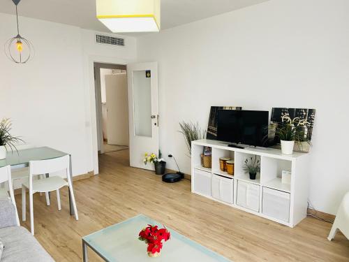 TV a/nebo společenská místnost v ubytování Betis a la Orilla del Guadalquivir & Vistas a la Giralda