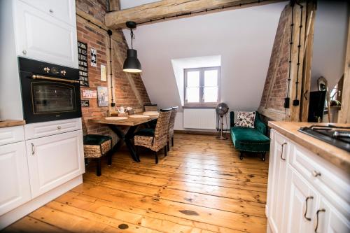 Kuchyň nebo kuchyňský kout v ubytování AP Apartment's