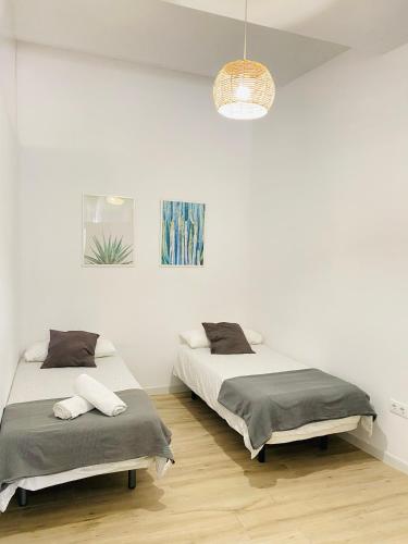 Flamenca Triana - Apartamento Wifi con 2 Dormitorios 2 sofas camas 2 baños