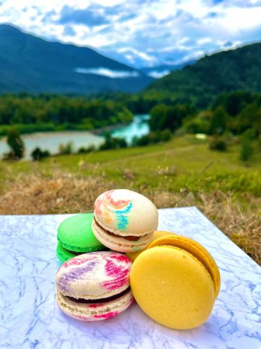 a pile of donuts sitting on a table with a view at Hotel Neyün La Junta in La Junta