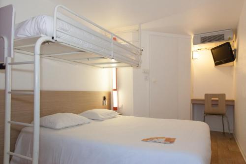 a bedroom with a bunk bed with a ladder at Premiere Classe Saint Malo St Jouan Des Guerets in Saint-Jouan-des-Guérets
