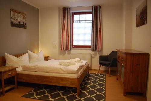 Ένα ή περισσότερα κρεβάτια σε δωμάτιο στο Bellevue-App-11