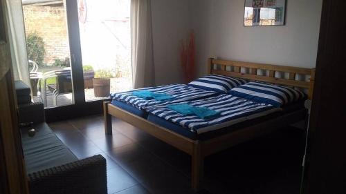 Postel nebo postele na pokoji v ubytování Chalupa U Bednáře