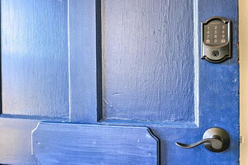 a blue door with a remote control on it at The Gallery, an Allentown Retreat with Views! in Allentown