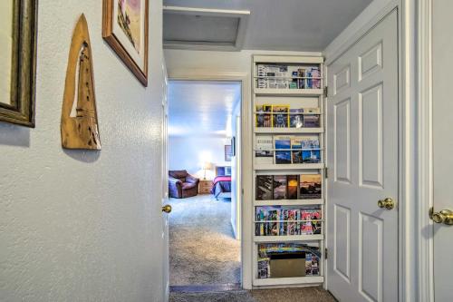 a hallway with a white door and a room at Cliffside Lighthouse Beach Home with Ocean View in Coos Bay