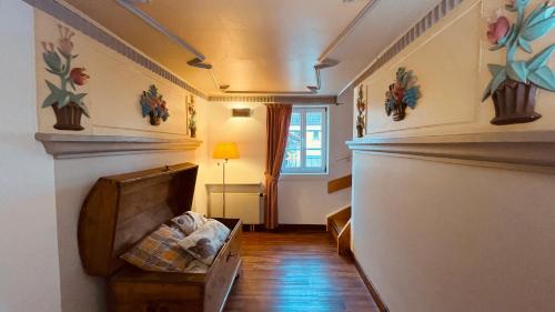 a hallway with a baby crib in a room at Salischer Hof in Schifferstadt
