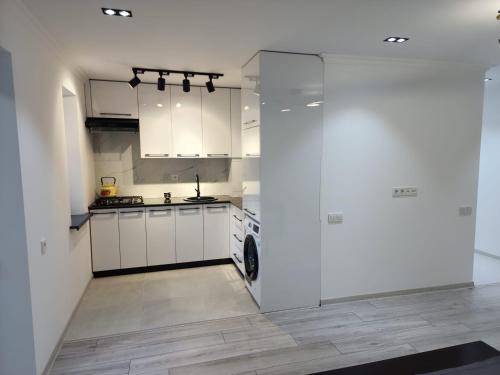 Dapur atau dapur kecil di Апартамент