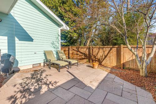 a patio with two chairs and a fence at Dewey Beach 102 Jersey St in Dewey Beach