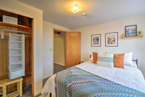 a bedroom with a large bed and a television at Port Angeles Pad Less Than 1 Mi to Olympic Natl Park in Port Angeles