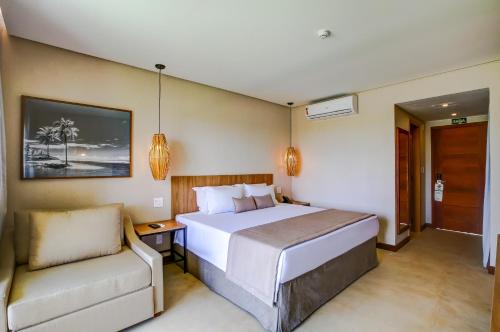 Cama o camas de una habitación en Hotel Boutique & Spa Ponta de Inhambupe by Slaviero Hotéis