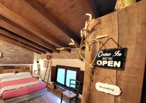 Cama o camas de una habitación en B&B Relais Cascina al Campaccio