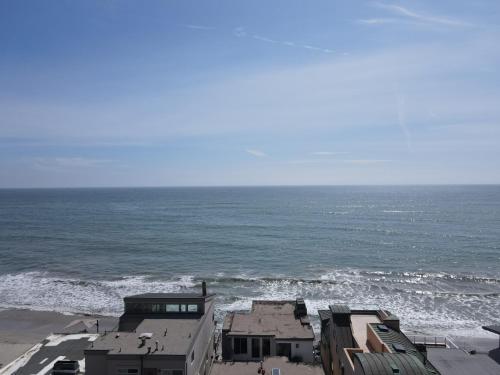 a view of the ocean from a building on the beach at OCEAN FRONT - STUNNING VIEWS- VACATION PARADISE!! in Dana Point