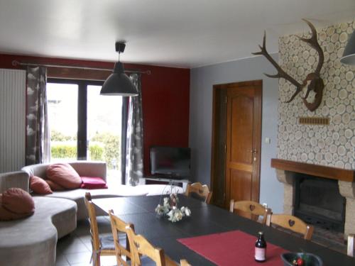 Posezení v ubytování Gîte Les Framboisiers