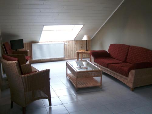 Posezení v ubytování Gîte Les Framboisiers