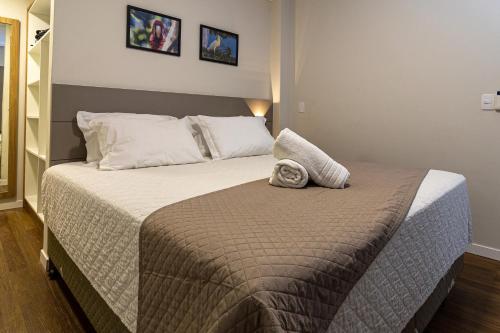 Tempat tidur dalam kamar di Gaivotas Praia Hotel