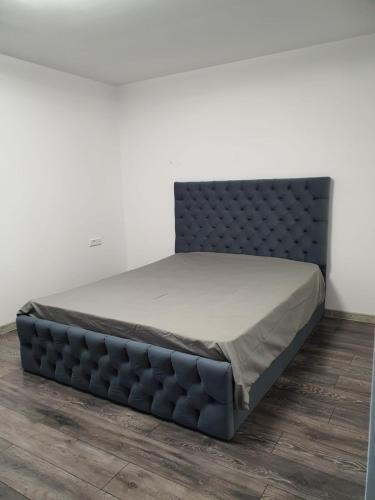 Postel nebo postele na pokoji v ubytování RazDav Delux Straja Central