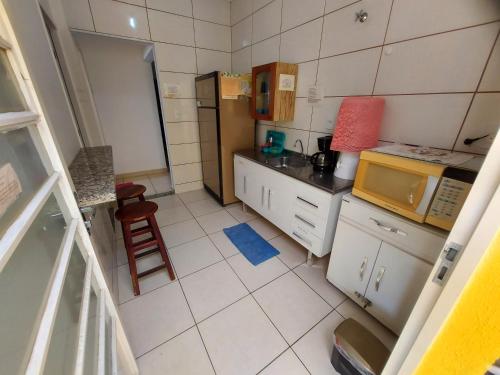 A cozinha ou kitchenette de Quartos com Banheiros privativos - Hospedagem Recanto do Luar